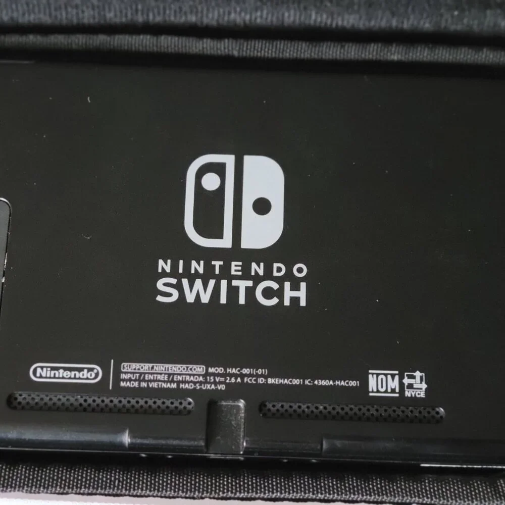 Nintendo Switch. Comes with case. No charger. Memory Card Included.